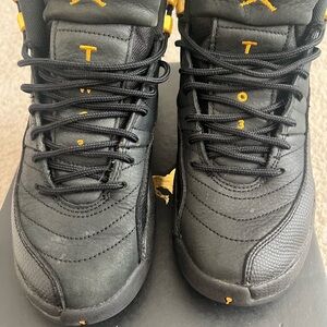 Jordan Black and Gold Sneakers